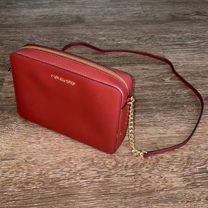 Red Michael Kors crossbody bag